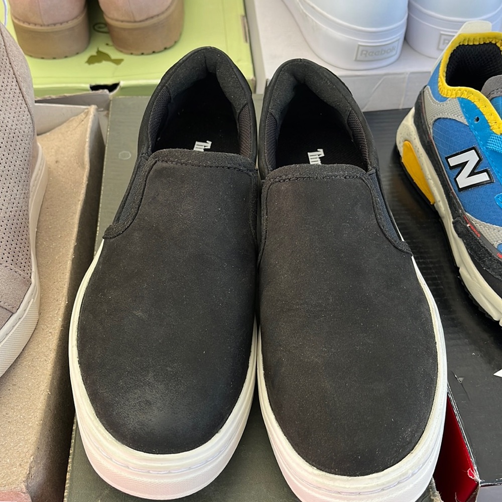 Black suede slip on shoes . Timberland